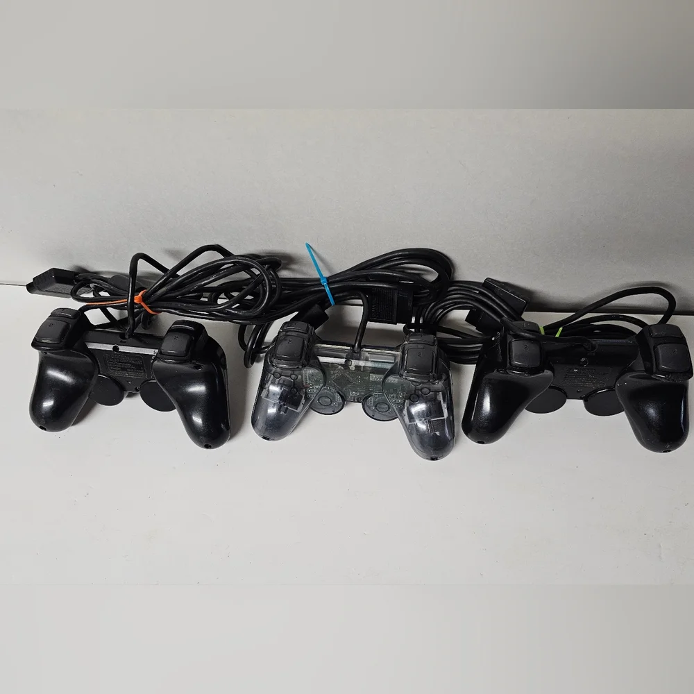 PlayStation 2 DualShock 2 Controllers Lot of 3 Black, 1 Transparent Black